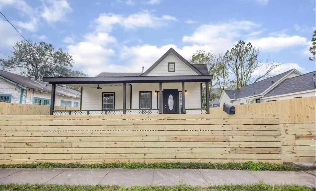 Transformed Home Exterior with Fresh Siding and Vibrant Paint